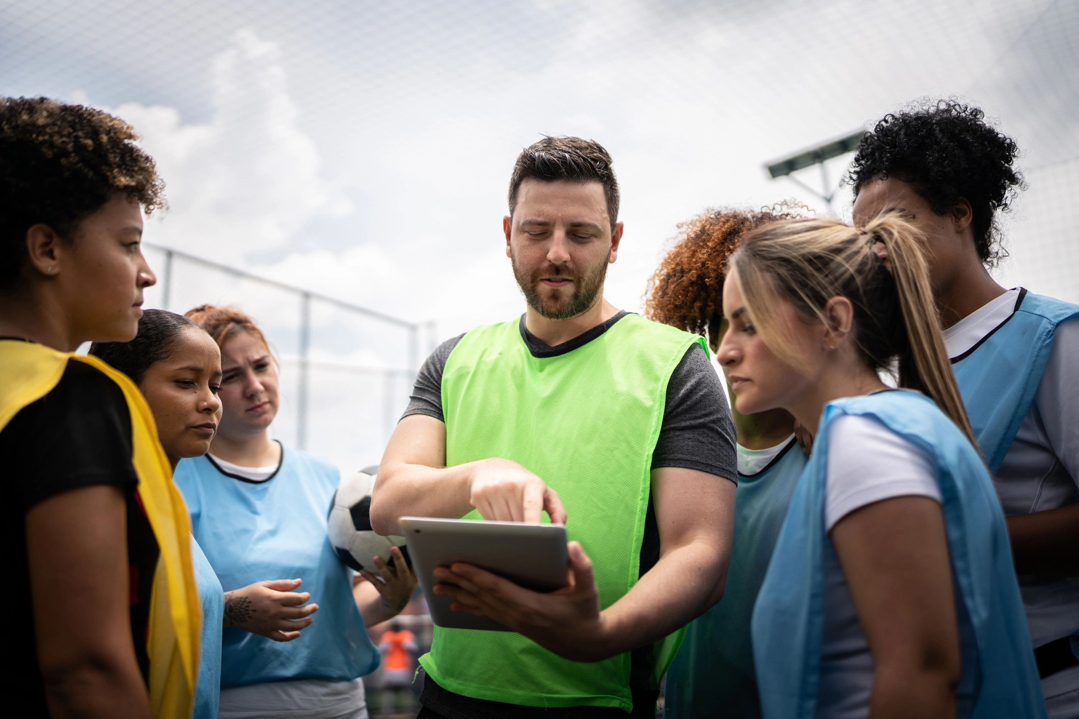 Coach and players planning together