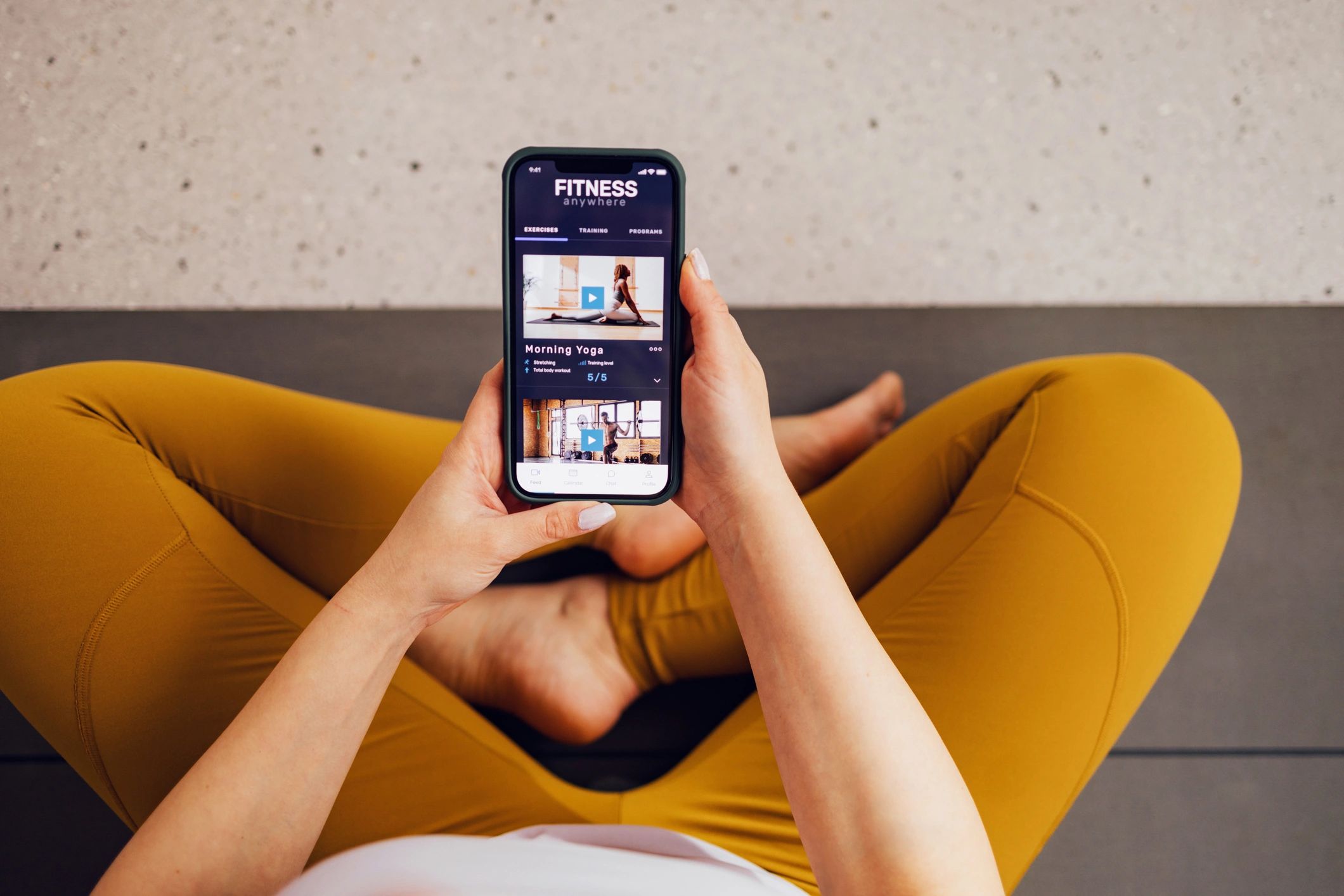 Person using a smartphone app indoors