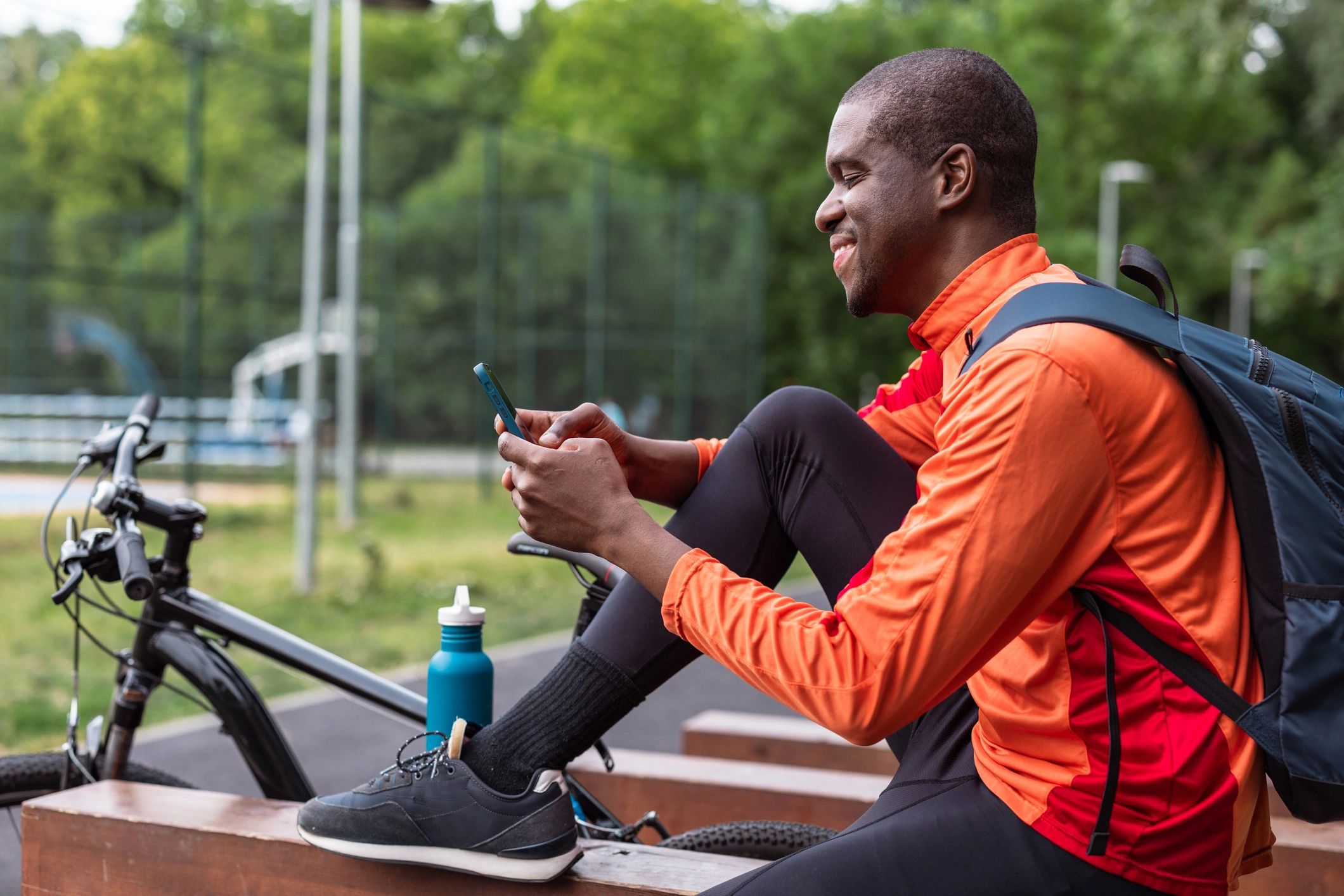Person checking a smartphone outdoors